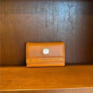 MCM Leather Wallet with Gold Accents